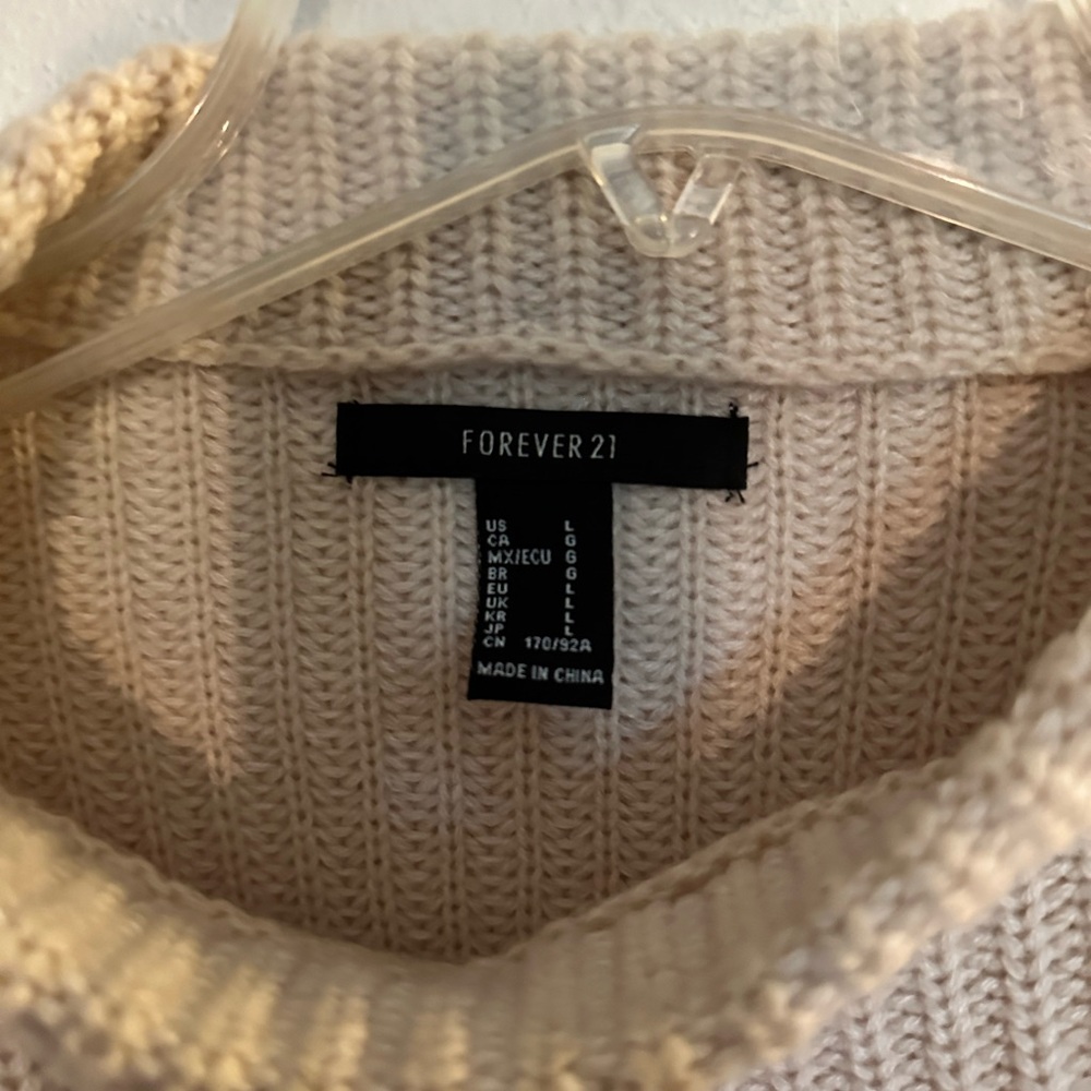 Neutral Forever21 sweater. Slight crop. Size L. run a tad small, I wore as a med
